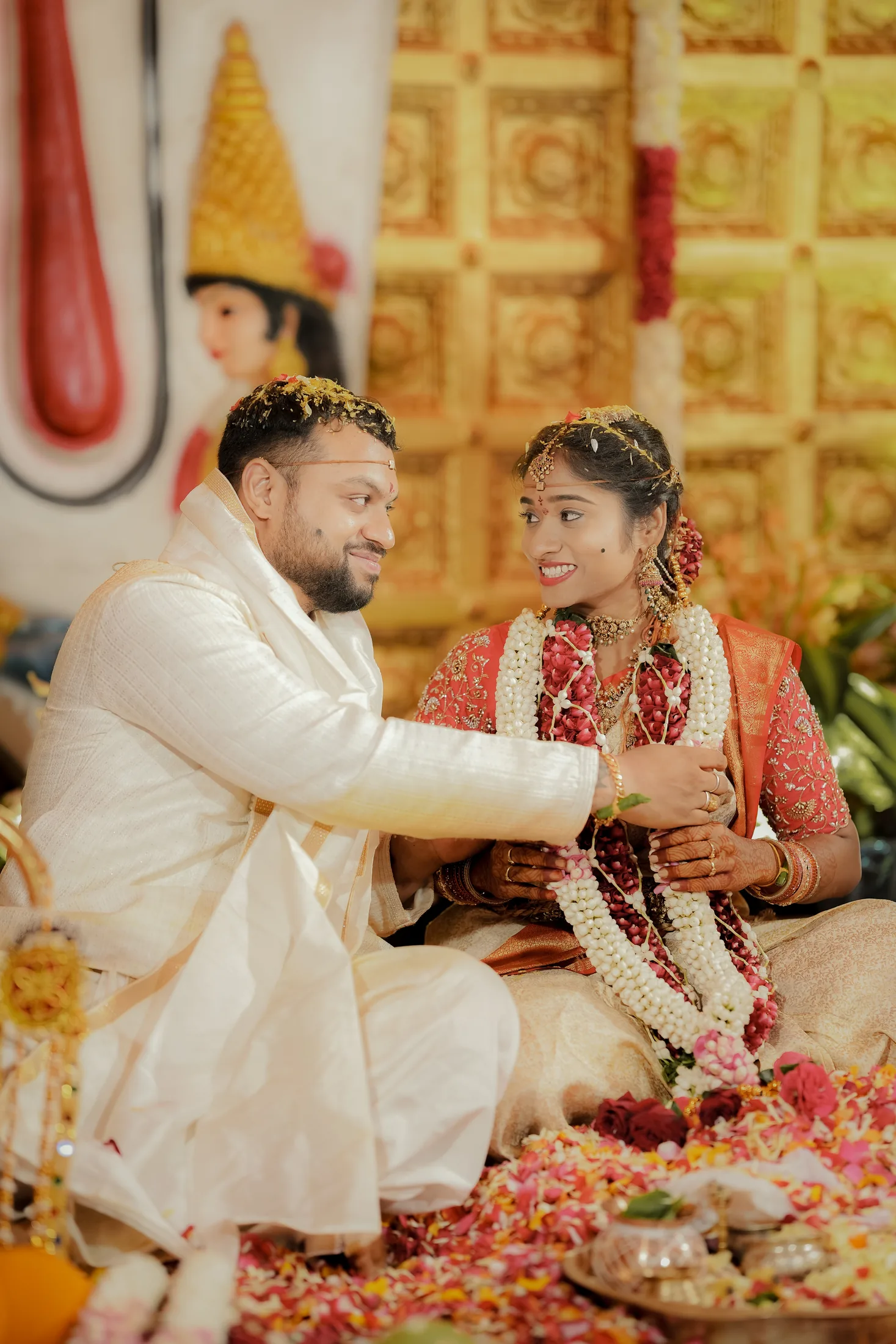 Couple sharing a moment during a traditional ceremony