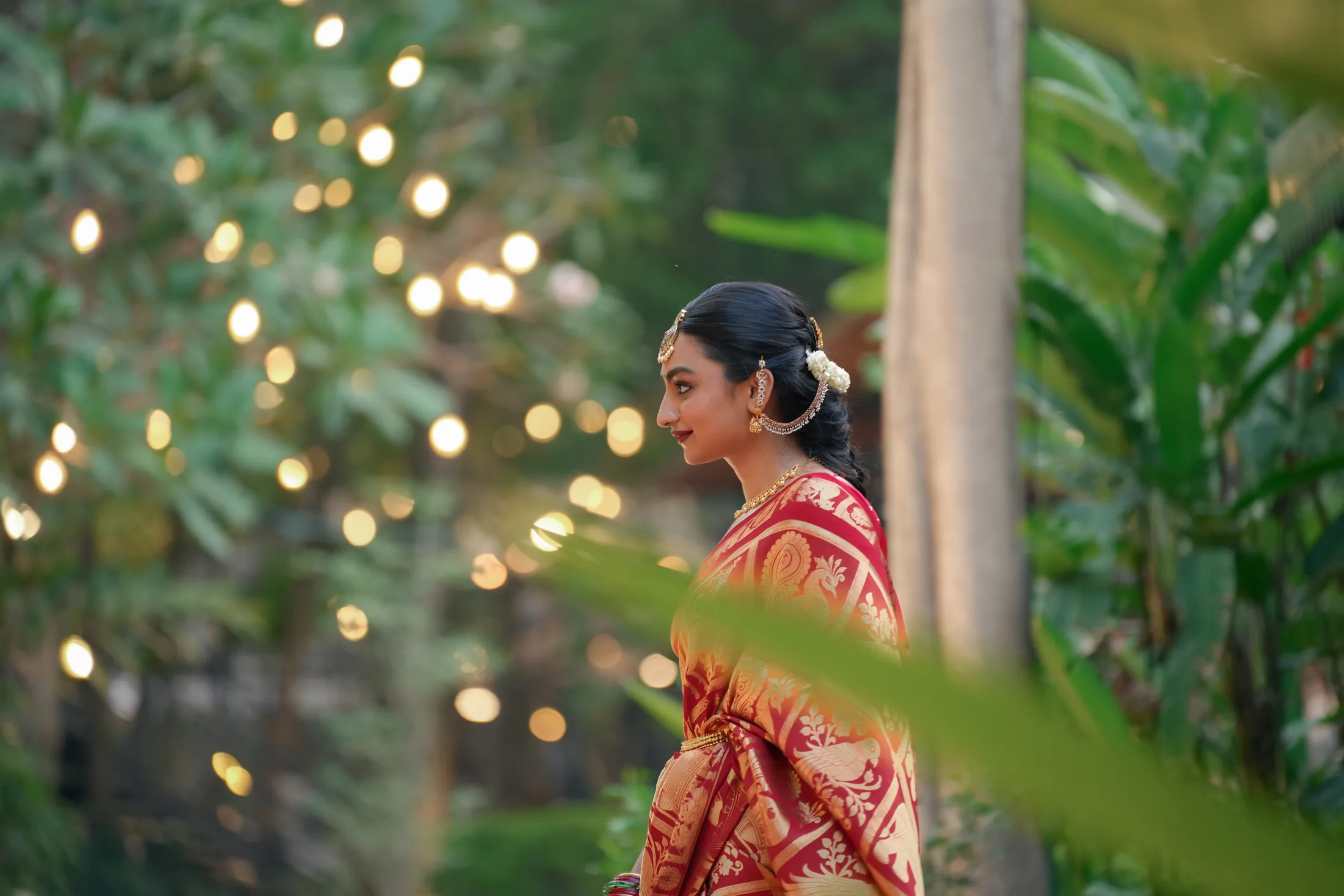 Bride walking through a garden