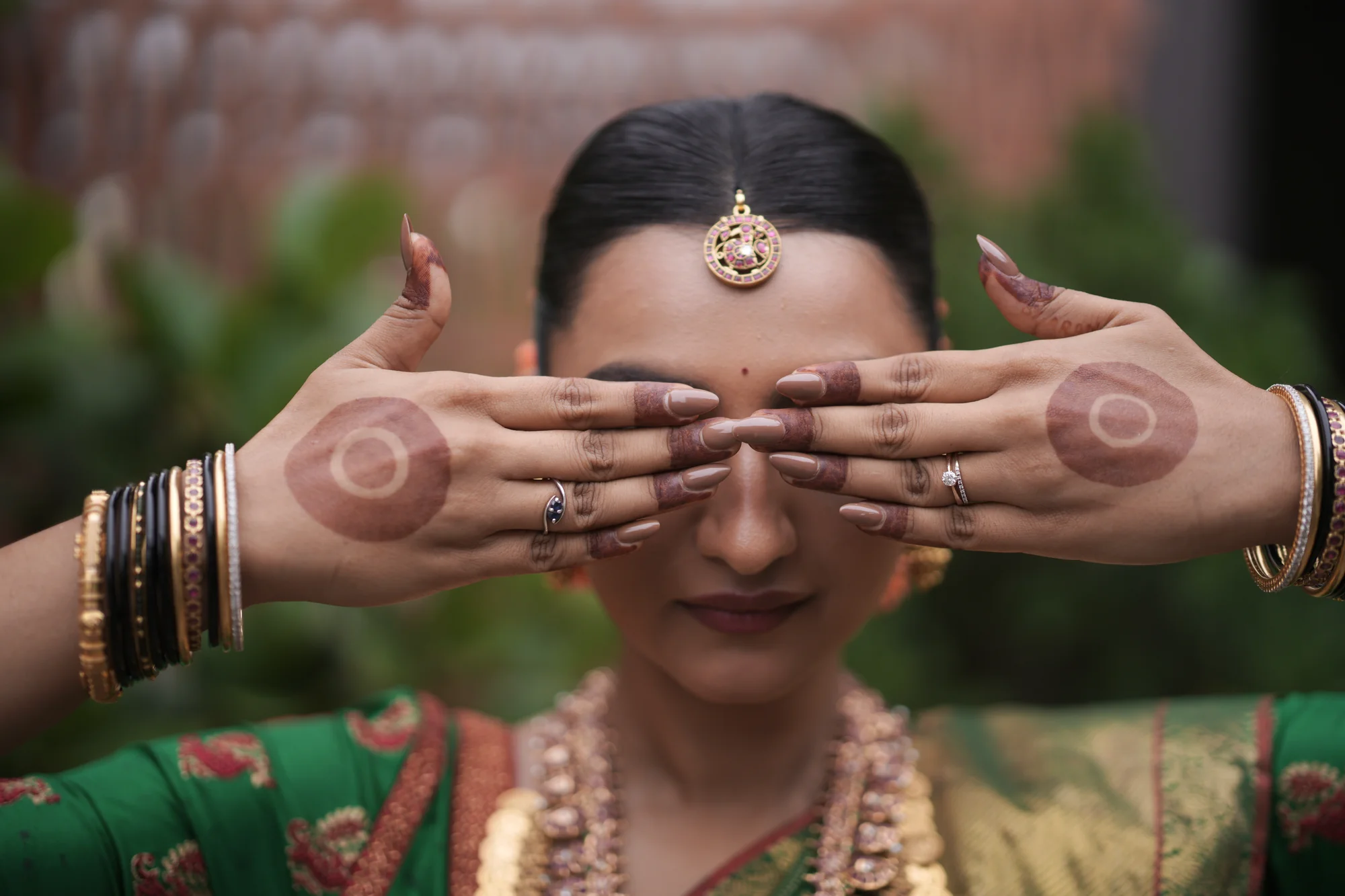 A bridal portrait with intricate mehendi