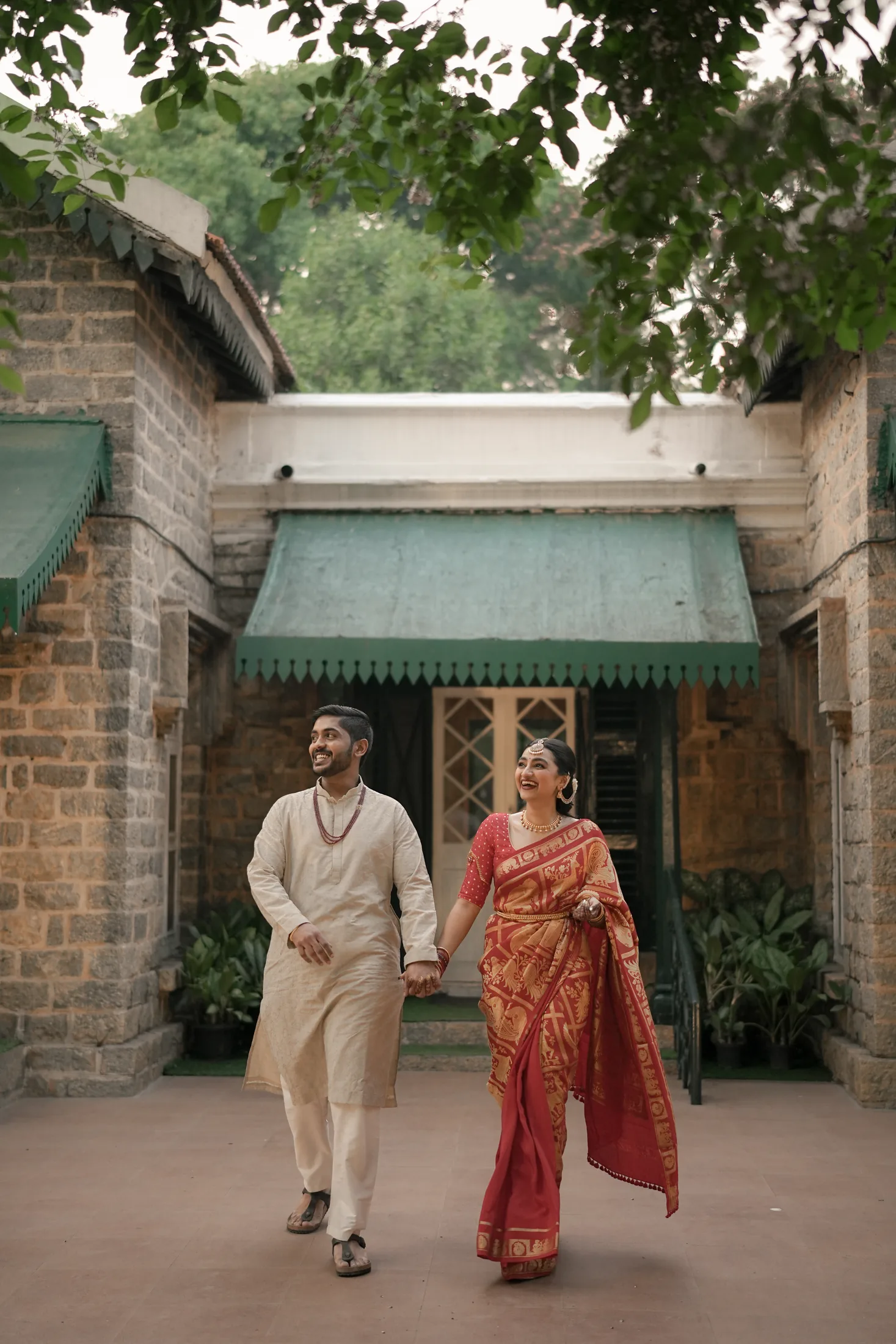 Couple walking outside a heritage home