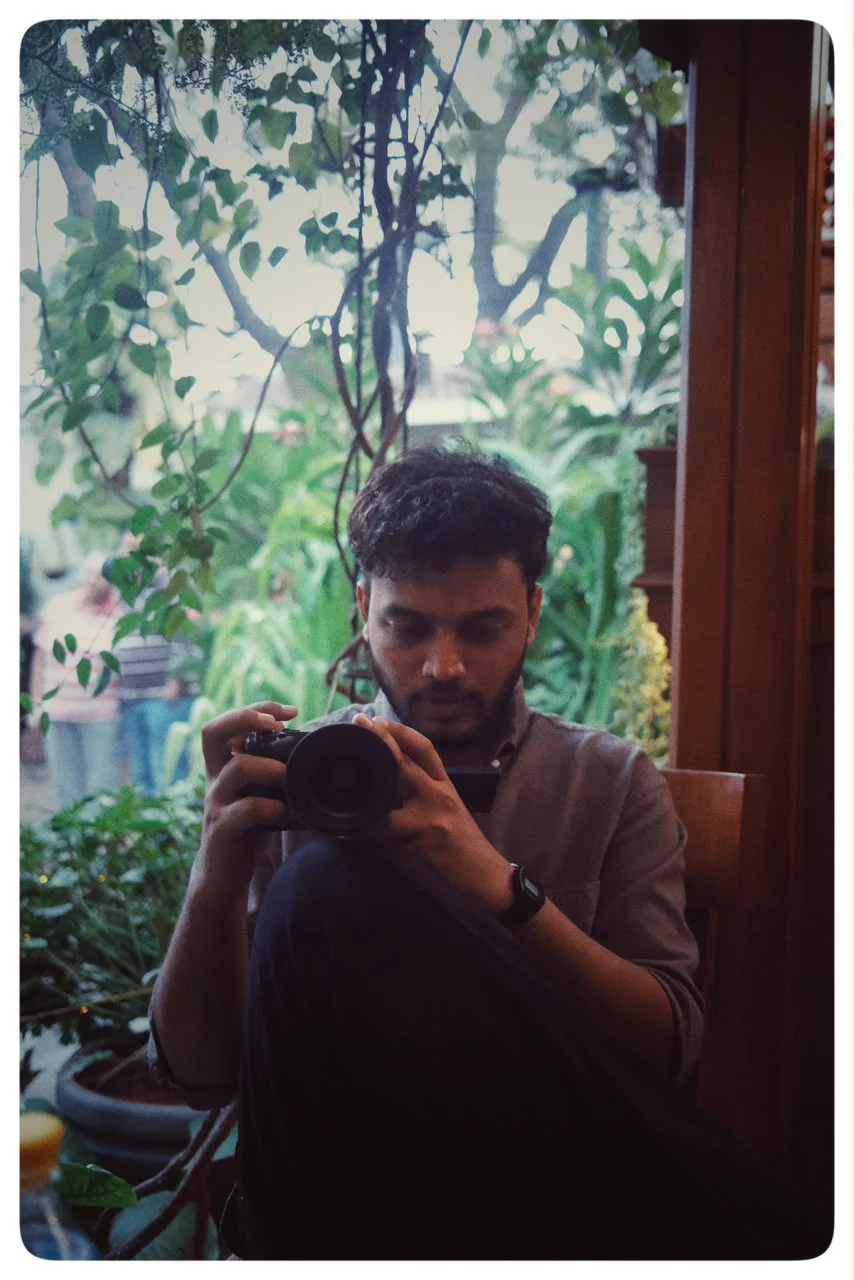 ARTHA Studios co-founder holding a camera